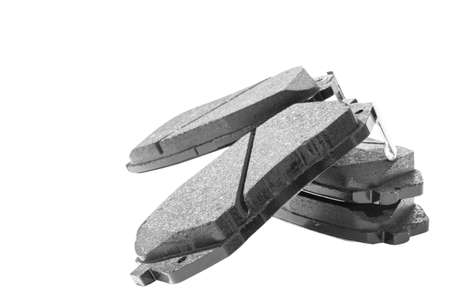 Car Brake pads isolated on white background. Auto parts. Brake pads isolated on white. Braking pads. Car part. Car detailing. Spare partsの写真素材