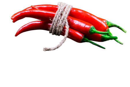 Stack of Red hot chili pepper isolated on white background.の写真素材