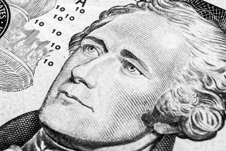 Close up view Portrait of Alexander Hamilton on the one ten dollar bill. Background of the money. 10 dollar bill with Alexander Hamilton eyes macro shot. Money background. Face portrait. Balck and whiteの写真素材