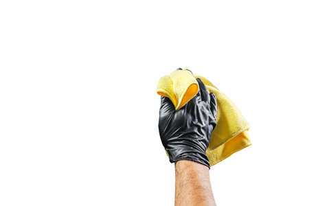 Washing concept. A male man hand with cloth isolated on white background. Worker cleaning. Cleaning with cloth, foam and brush. Cleaning concept. Hand in black protective rubber gloveの写真素材