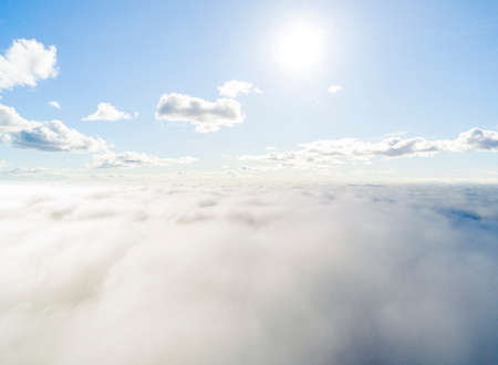 Aerial view White clouds in blue sky. Top view. View from drone. Aerial bird's eye view. Aerial top...