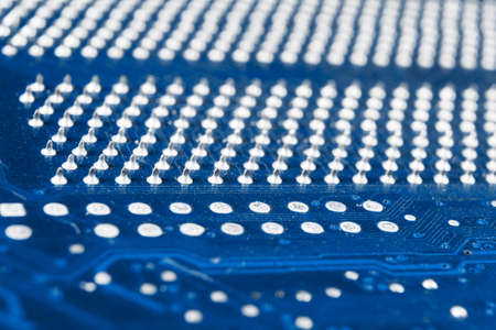 Macro shot of Circuit board with resistors microchips and electronic components. Computer hardware...