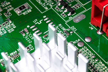 Macro shot of Circuit board with resistors microchips and electronic components. Computer hardware...