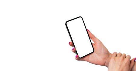 Smartphone mockup in woman hand isolated on white background. Modern frameless smartphone mock up...