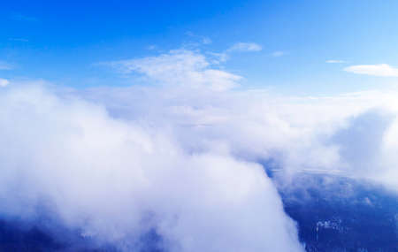 Aerial view White clouds in blue sky. Top view. View from drone. Aerial bird's eye view. Aerial top...
