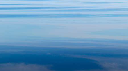 Water surface. View of a Crystal clear sea water texture. Landscape. Small waves. Water reflectionの写真素材