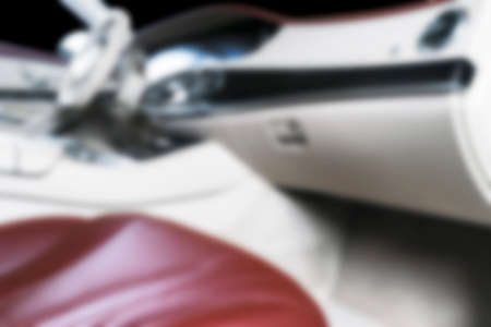 Blurred image of car interior. Dashboard. Blur defocused transportation background. Driving inside...