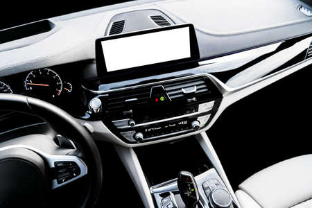 Monitor in car with isolated blank screen use for navigation maps and GPS. Isolated on white with...