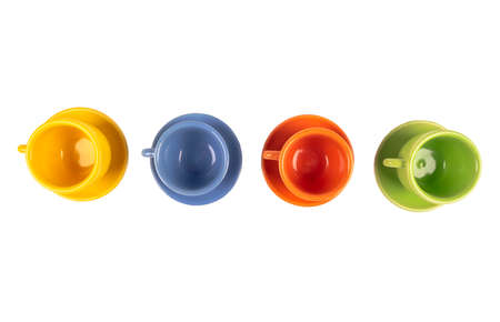 Four different colour empty coffee ceramic cups or tea cup isolated on white with clipping path....