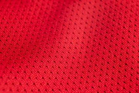 Macro shot red  cotton fabric texture with waves. Linen natural canvas texture with pattern. Fabric texture. Rough fabric background textureの写真素材