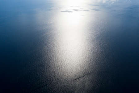 Aerial view small clouds over the sea. View from drone. Aerial top view cloudscape. Texture of clouds. View from above. Sunrise or sunset over clouds. Aerial ocean backgroundの写真素材