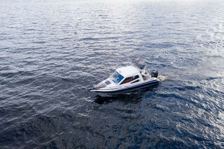 Aerial view fisherman on boat at the ocean. Top view beautiful seascape with the fishing boat....