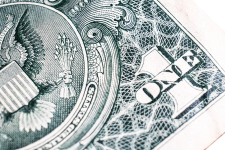 One dollar bill close up photo. Detail of US one dollar banknote with. Macro shot of single dollar bill. Top view of USA currency note with inscriptionsの写真素材