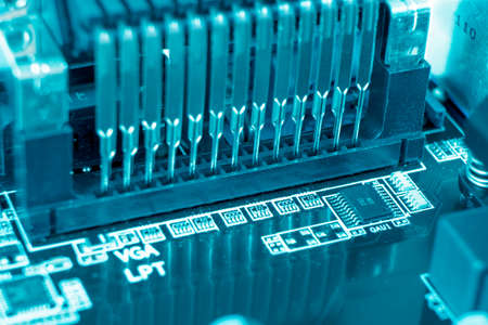 Macro shot of Circuit board with resistors microchips and electronic components. Computer hardware...