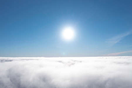 Aerial view white clouds in blue sky. View from drone. Aerial top view cloudscape. Texture of clouds. View from above. Panorama skyの写真素材
