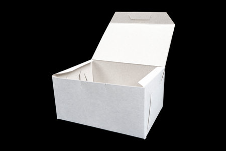 Side view white empty disposable paper fast food tray isolated on black background. Paper box...