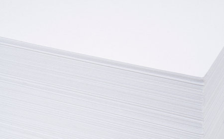 Close up of a stack of paper background. A4 blank paper stack texture. Mockup. Stack of blank paper...