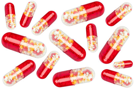 Macro shot red tablets pill isolated on white background. Pharmacy products. Medicine pills and drugs close up. Health care. Pills backgroundの写真素材
