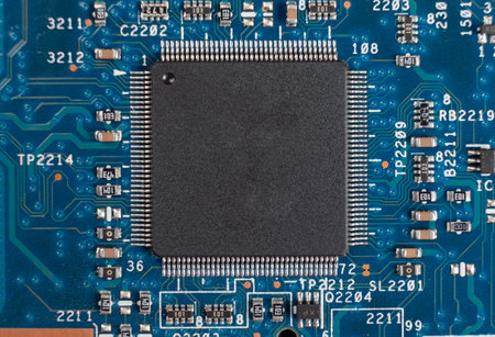 Macro shot of Circuit board with resistors microchips and electronic components. Computer hardware...