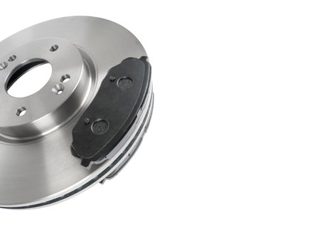 Brake discs and brake pads isolated on white background. Auto parts. Brake disc rotor isolated on...