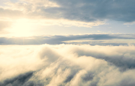 Aerial view white clouds in blue sky. View from drone. Aerial view cloudscape texture background....