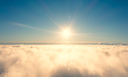 Aerial view white clouds in blue sky. View from drone. Aerial top view cloudscape. Texture of...