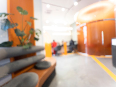 Blurred background. Blur office with people and bokeh light background. Business concept.の写真素材