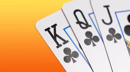 Playing cards isolated on color background. Hand of playing clubs cards isolated.