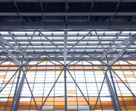 Lights and ventilation system in long line on ceiling of the  industrial building. Exhibition Hall. Ceiling factory constructionの写真素材