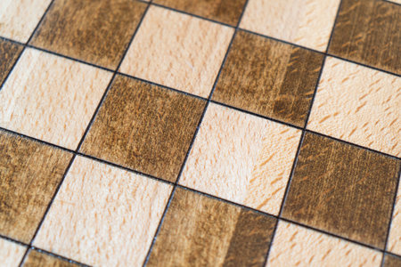 Empty wooden chessboard pattern. Top view. Board made of wood for playing chess. Chessboard texture background.の写真素材