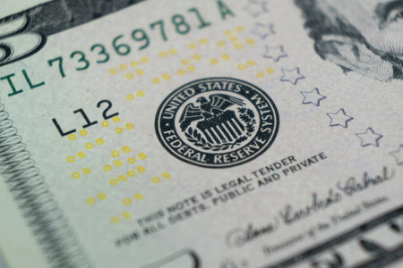 Macro shot image of the corner of a 5 dollar bill banknotes. Concept of financial success....