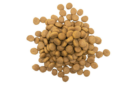 Dry pet food isolated on white background. Food for cats and dogs pattern. Heap of granulated animal...