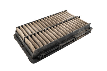 Used car cabin charcoal air filter texture background. Dirty carbon car air filter with dust...