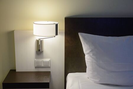 Wall lamp in modern bedroomの写真素材