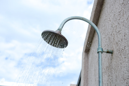 water from antique rain shower outdoorの写真素材