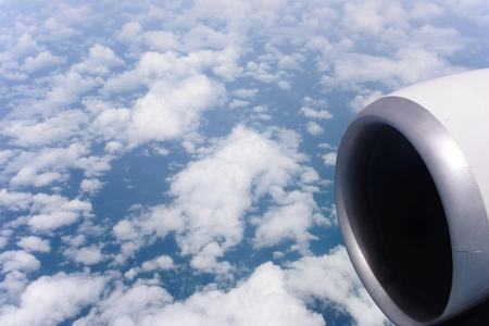 Clouds and sky from airplane window