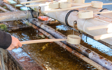 Cleansing ceremony, hand wash pavilion before enter the shrine gate in Japan