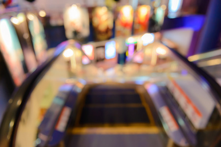 Abstract blurred image of escalator in movie theater.