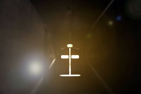 Abstract blurred image of Emergency Exit with Exit Sign.