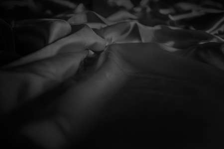 abstract background crumpled or wavy folds of fabric texture, pattern elegant wallpaper designの写真素材