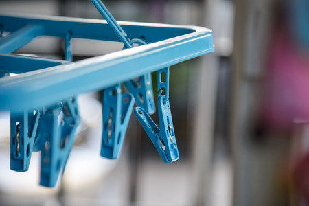 blue plastic clothespinの写真素材