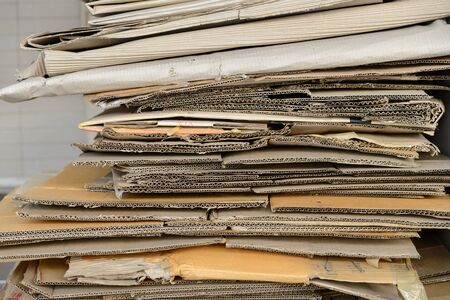 Stacking of used cardboard box for recyclingの写真素材