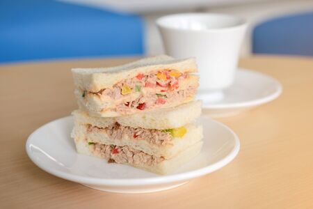 Tuna sandwich with hot teaの写真素材