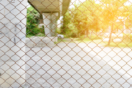 Rusty old wired fenceの写真素材