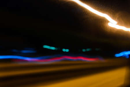 abstract motion lights of night traffic in the cityの写真素材
