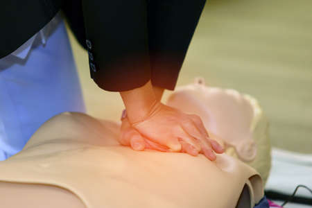 CPR First Aid Training with CPR dummy in the classの写真素材