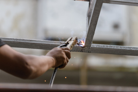 Industrial worker labourer welding steel structuresの写真素材
