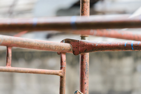 scaffolding in construction. scaffold pipe clamp and parts, construction site.の写真素材