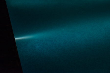lighting fittings under water in swimming pool at night