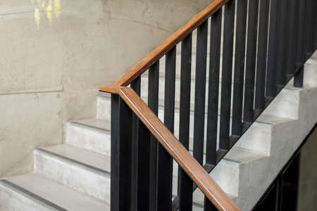 Modern wood handrail in the building - design / interior